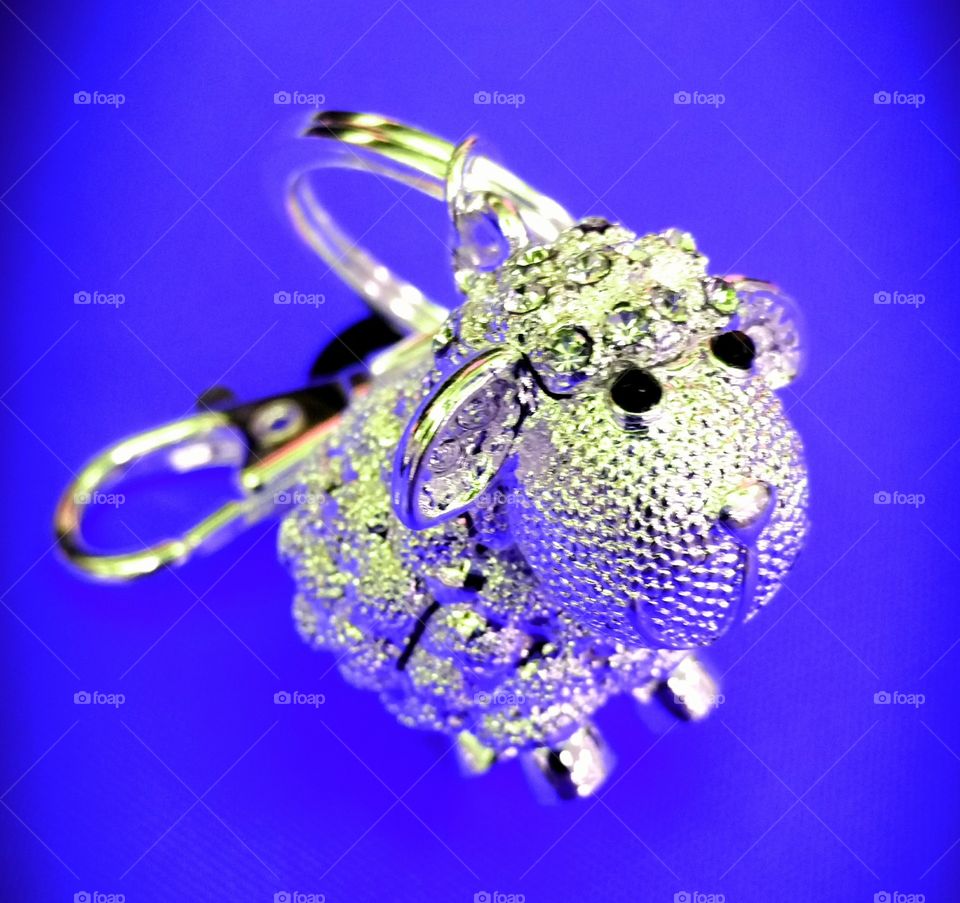 silver sheep in blue