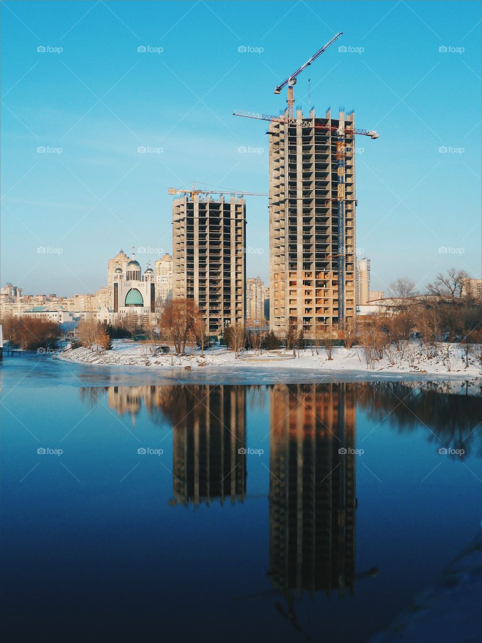 an incredible reflection of buildings in the river Dnepr