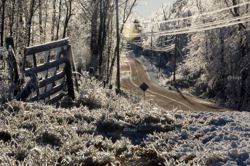 Winding road on an ice encased morning after an ice store