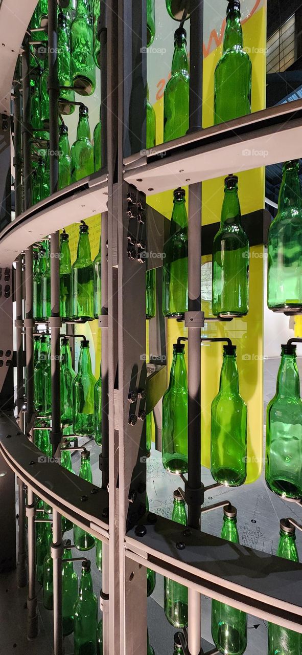 A Wall Of Green Bottles