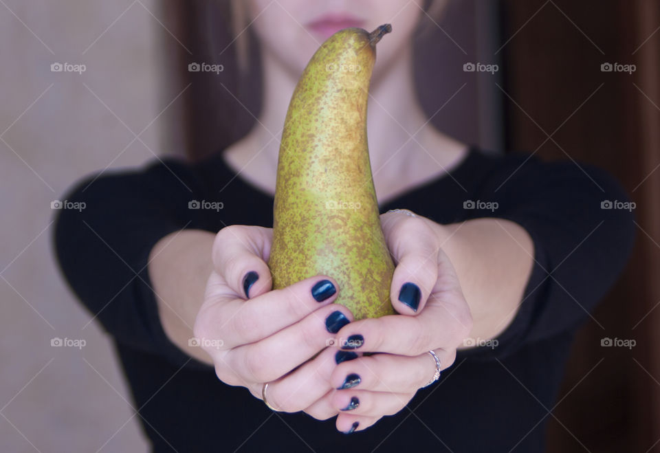 Girl holding fruits and vegetables