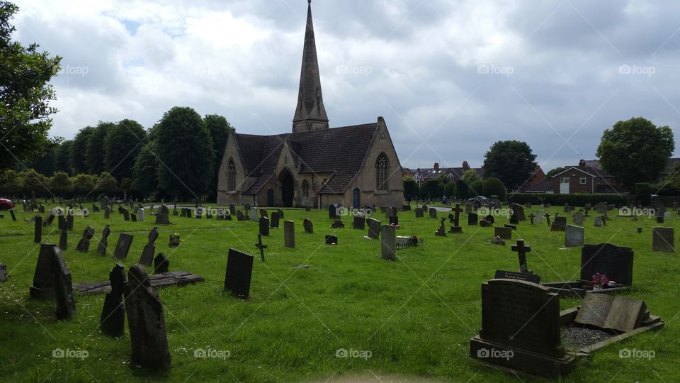 ancient disused church &
English cemetery
100 + years old graves
Some people think graveyard and cemetery mean the same, but, if we want to be a little nitpicky, we should say that graveyard is a type of cemetery, but a cemetery is usually not a graveyard. To understand the difference, we need a little bit of history.
From about the 7th century, the process of burial was firmly in the hands of the Church (meaning the organization), and burying the dead was only allowed on the lands near a church (now referring to the building), the so-called churchyard. The part of the churchyard used for burial is called graveyard, an example of which you can see in the picture.
As the population of Europe started to grow, the capacity of graveyards was no longer sufficient (the population of modern Europe is almost 40 times higher than it was in the 7th century). By the end of the 18th century, the unsustainability of church burials became apparent, and completely new places, independent of graveyards, were devised—and these were called cemeteries.
The etymology of the two words is also quite intriguing. The origin of "graveyard" is rather obvious; it is a yard filled with graves. However, you might be surprised to hear that "grave" comes from Proto-Germanic *graban, meaning "to dig", and is unrelated to "gravel".
Of course, the word "cemetery" did not appear out of the blue when graveyards started to burst at the seams. It comes from Old French cimetiere, which meant, well, graveyard. Nevertheless, the French word originally comes from Greek koimeterion, meaning "a sleeping place". Isn't that poetic?