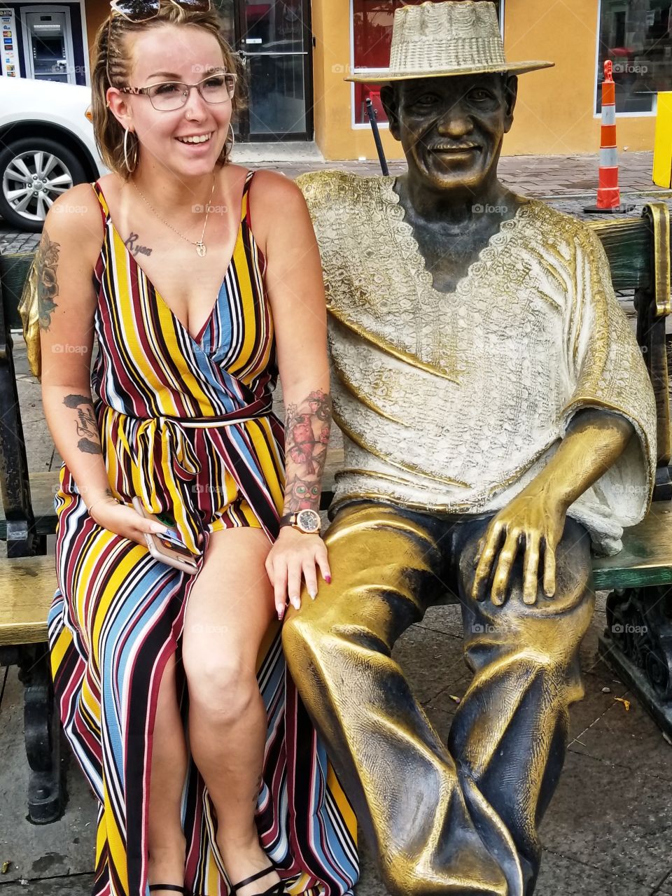 Sitting next to statue pretending its your new friend😂
