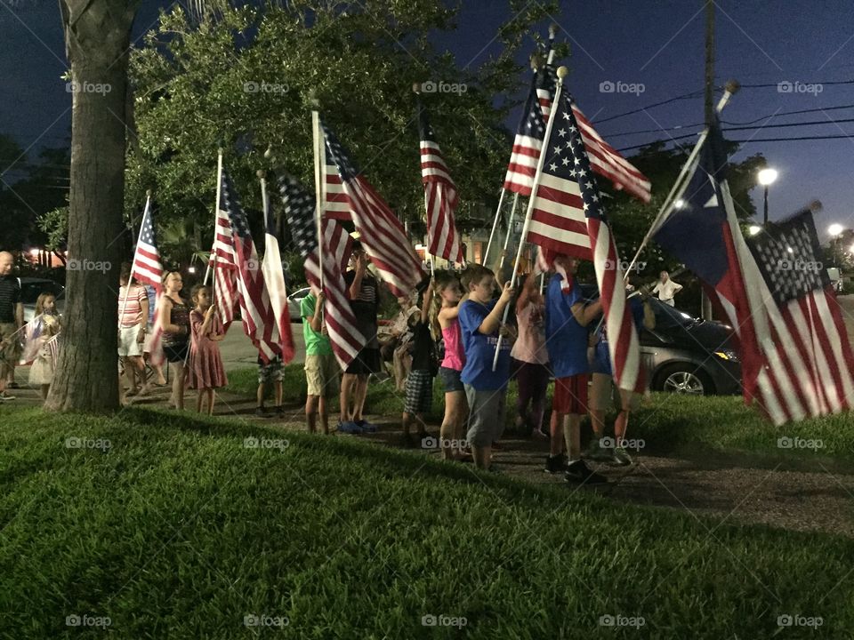 Flag parade at the Galveston Beach Band concert.