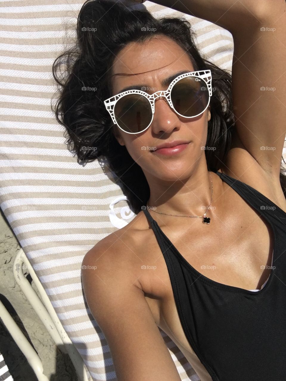 Elevated view of a beautiful woman wearing sunglasses