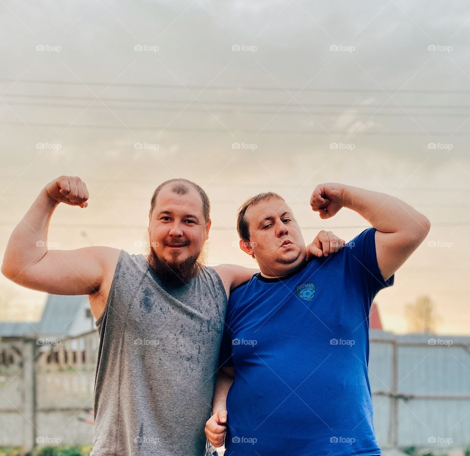 Two funny mans  outdoors portrait 