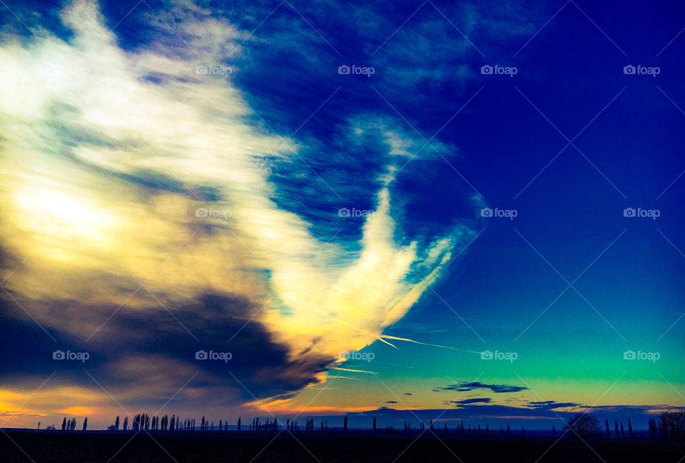 landscape with colorful sky.