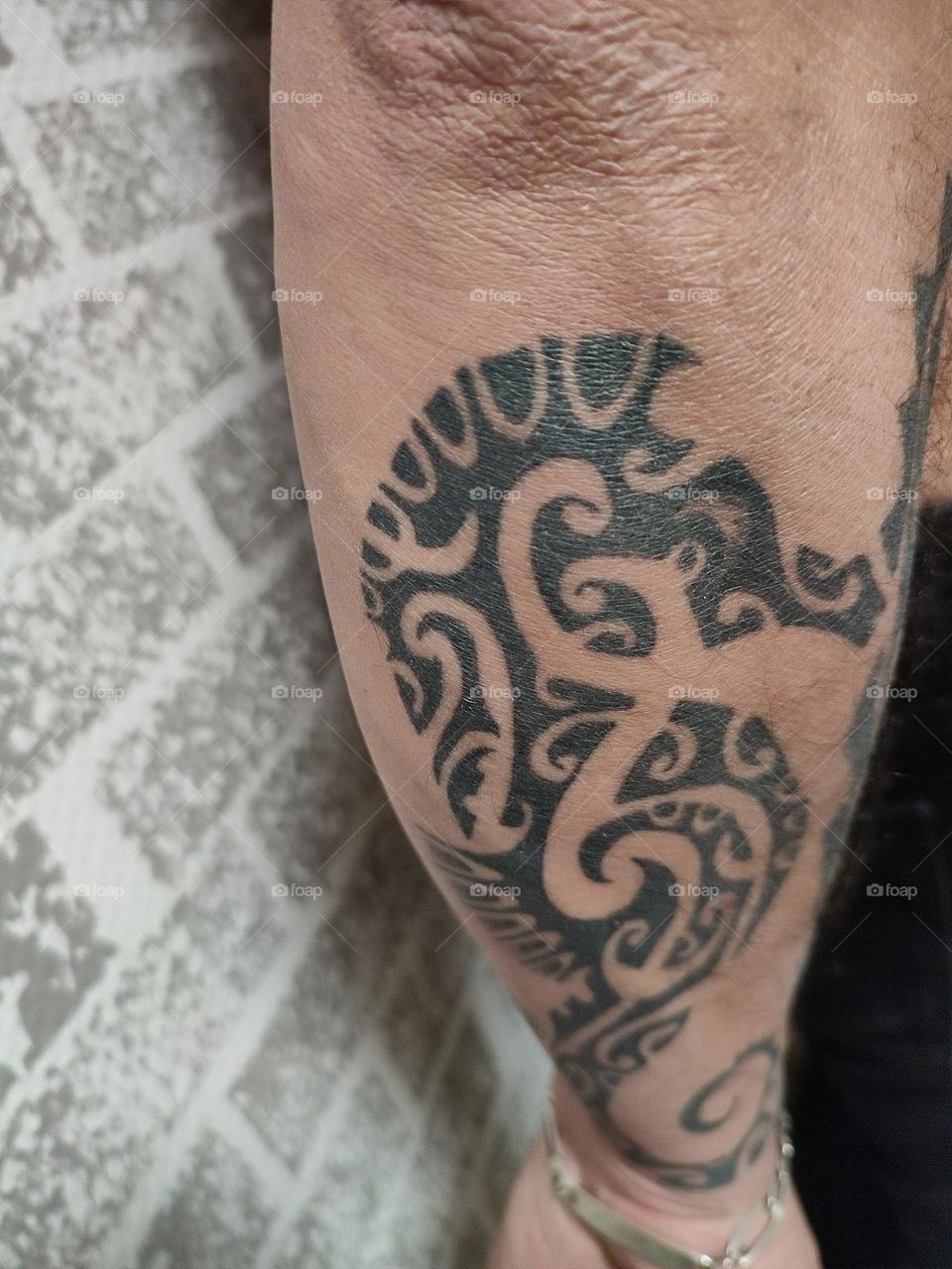 Here are our tattoos, to my wife and me.