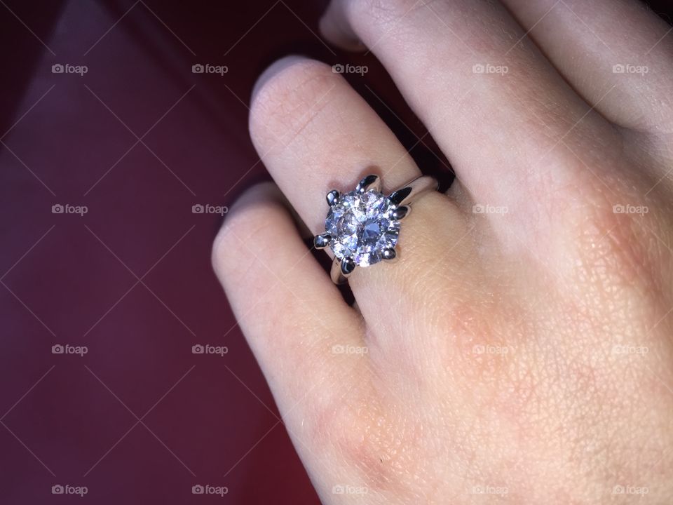 Stunning real diamond ring on a woman’s left hand