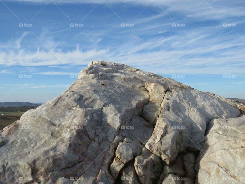 The Rock and the Sky huging each other