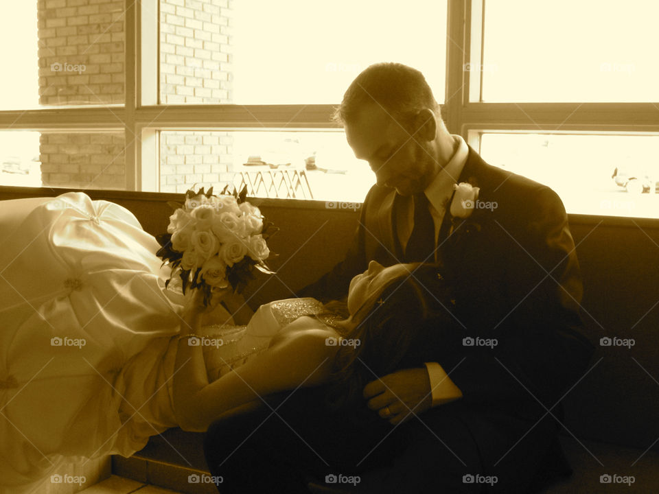 New bride looking adoringly up at her new husband 