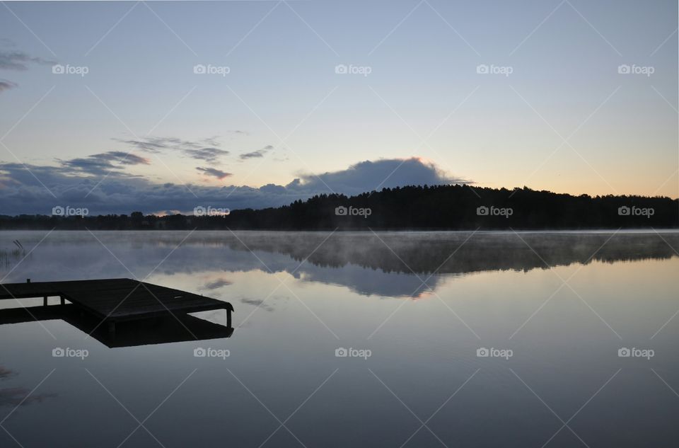 beautiful morning lake in polish countryside