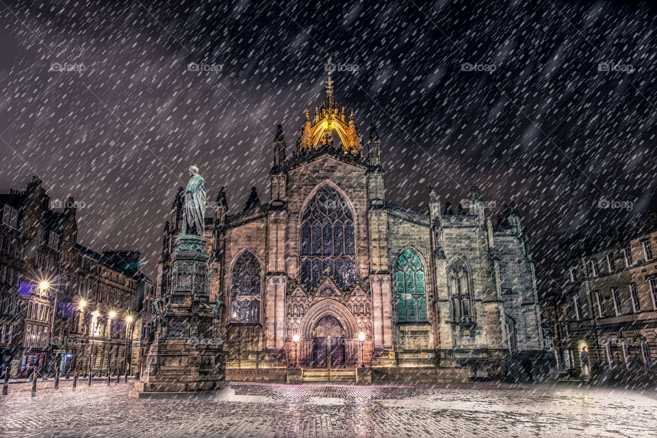 Snowy winter scene of a gothic style cathedral. St Giles cathedral - Edinburgh, Scotland