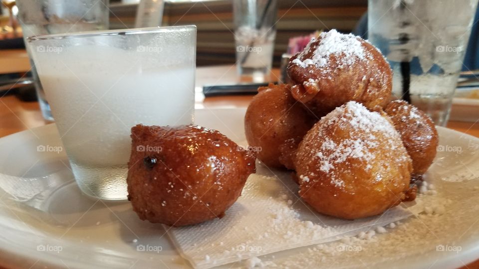 Yummy Donut Holes with Peanut BUTTER dipping sauce.