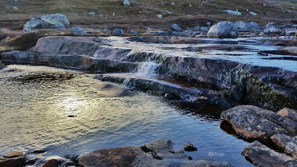 Reflections in waterfall