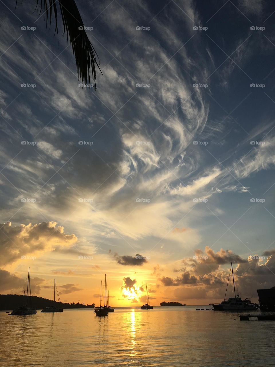 Dynamic clouds as a painting in the Polynesian sky