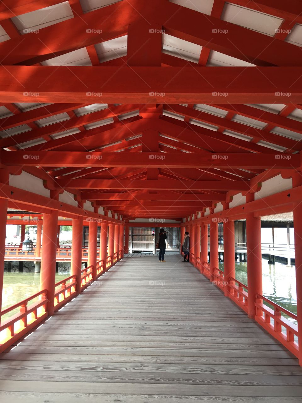 Vermillion walkway on a shrine in Miyajima.