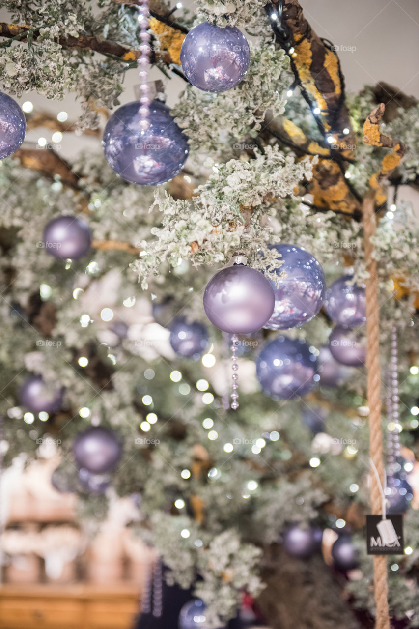 Christmas tree ornaments and decorations on display in a store in Sweden.