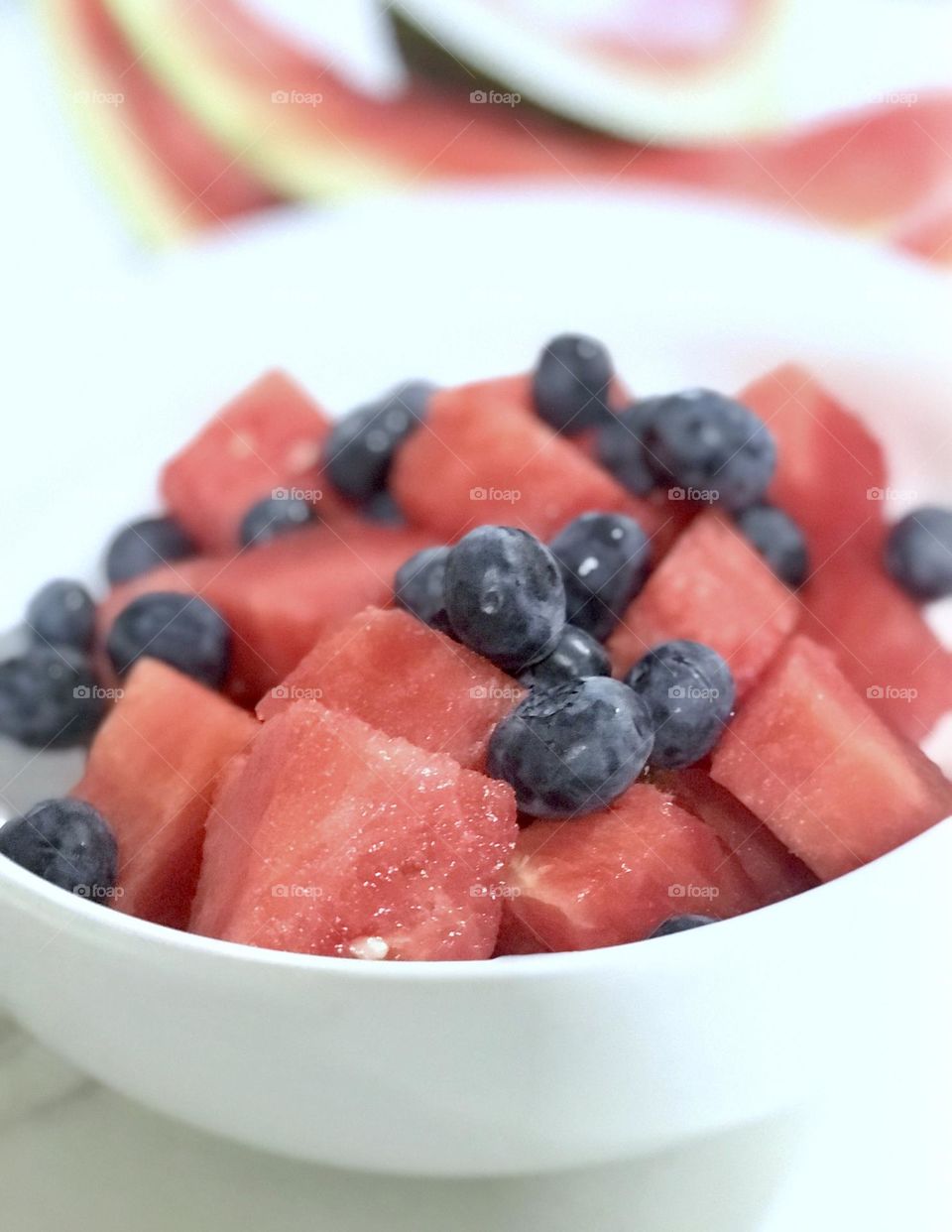 Bowl of refreshing watermelon and blueberries.