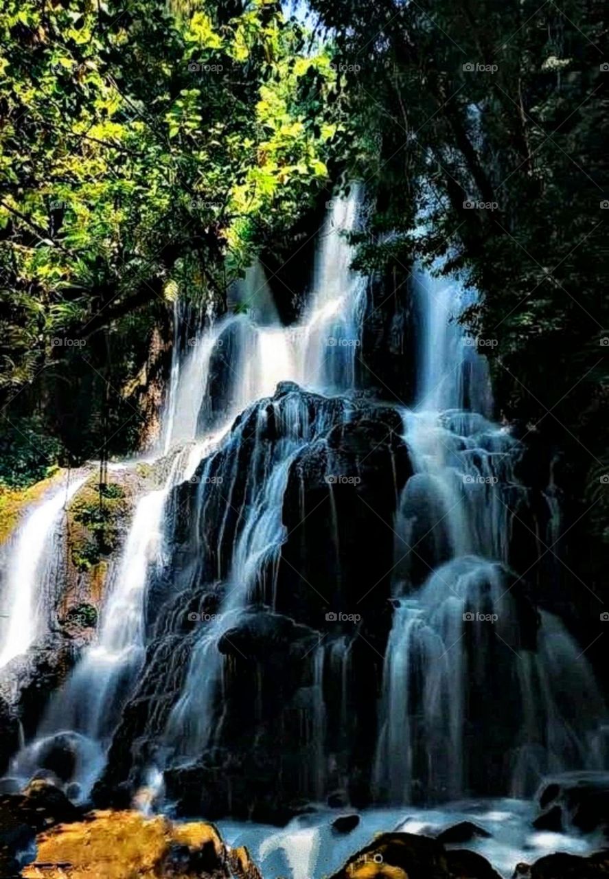 A most beautiful and attractive view of a waterfall.