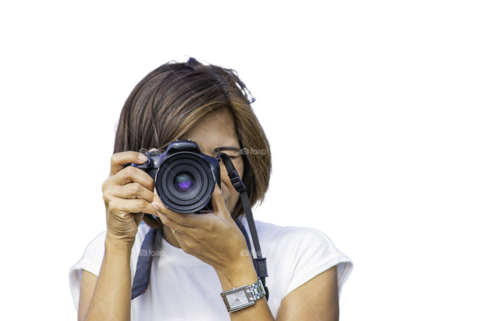 Isolated Hand woman holding the camera Taking pictures on a white background with clipping path.