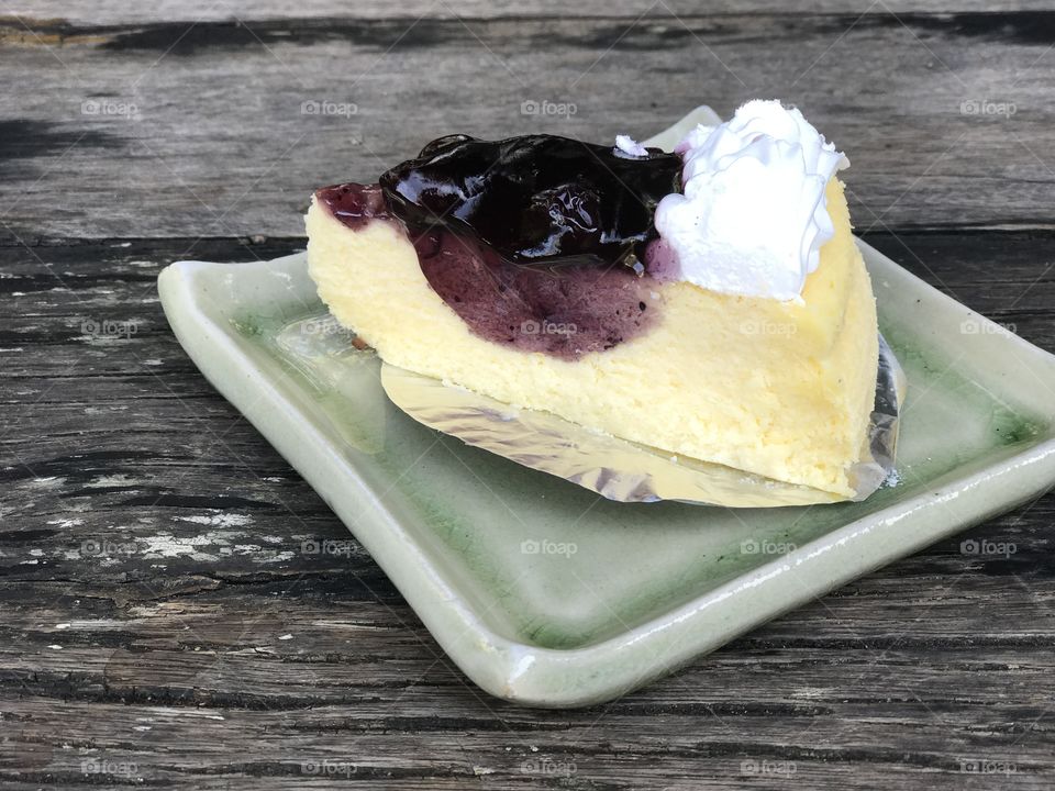 Blueberry cake on wooden table