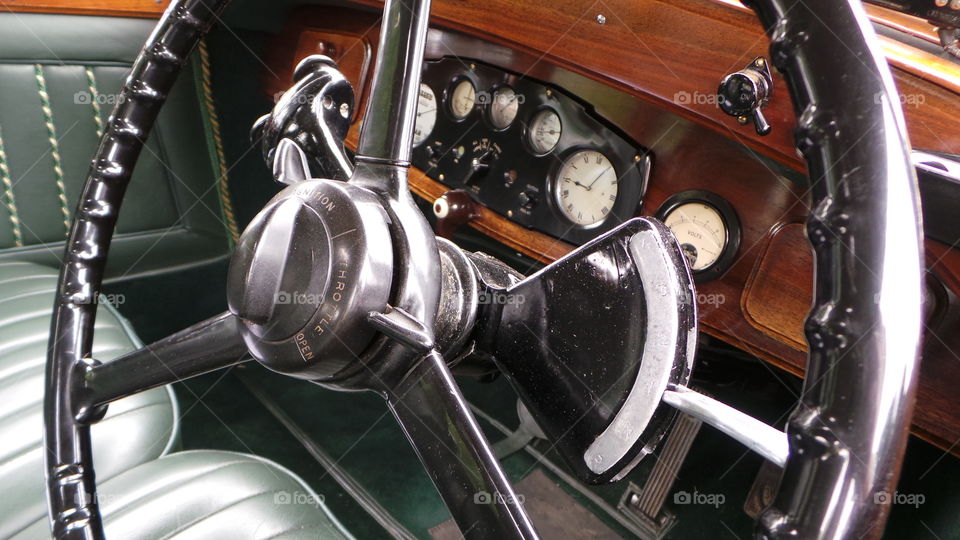 vintage  wooden car dashboard and stirring