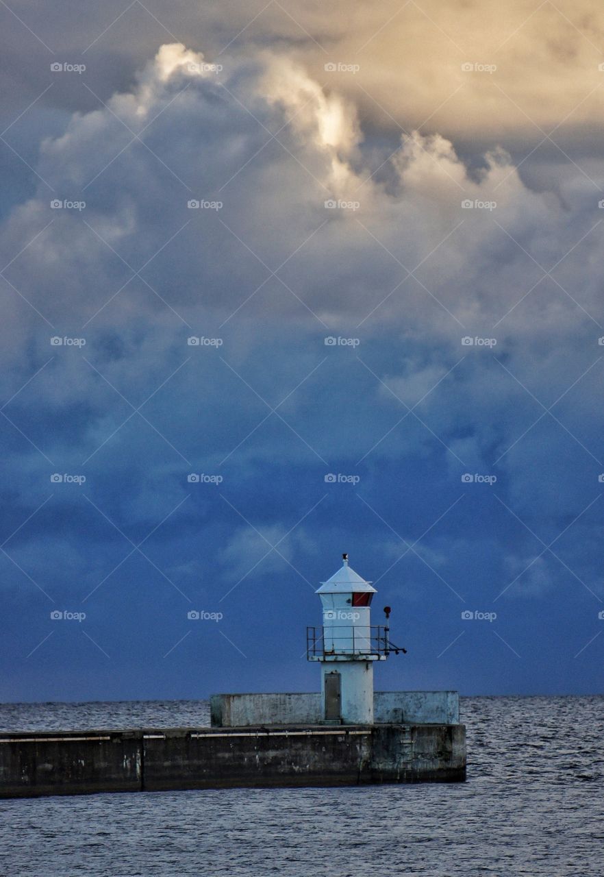 Lighthouse in clouds