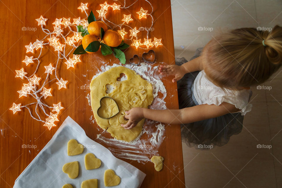 Little girl preparing snacks for Santa