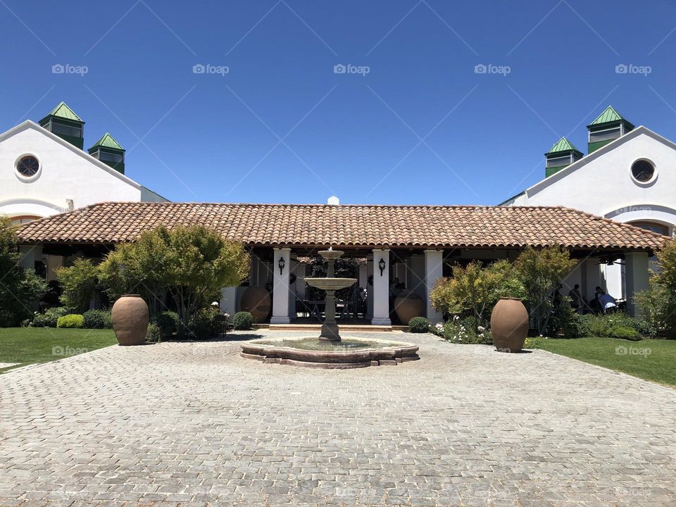 Beautiful farm house facade view in a blue sky