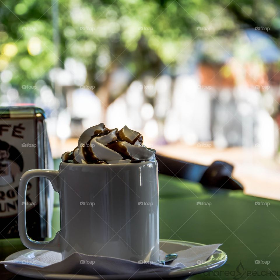 A mug with cappuccino 