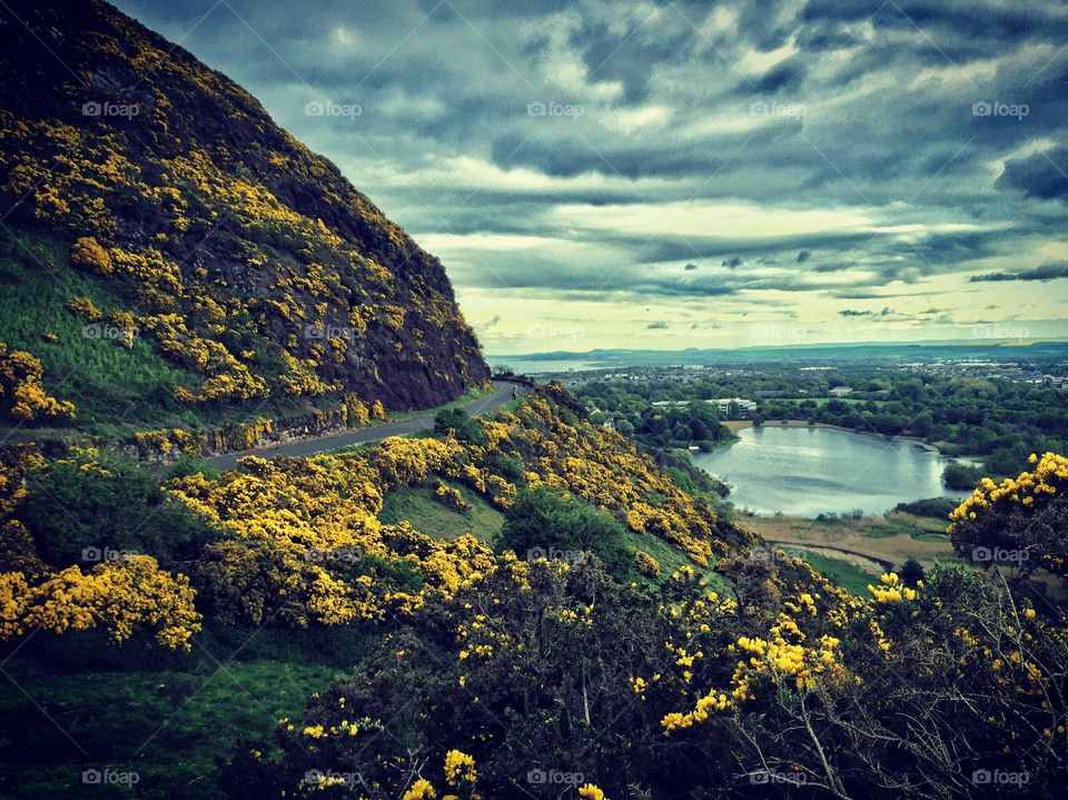 Cloudy sky reflecting in river