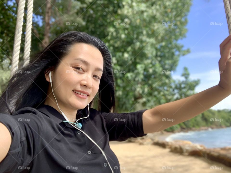 Girl in black who got big smile on her face 