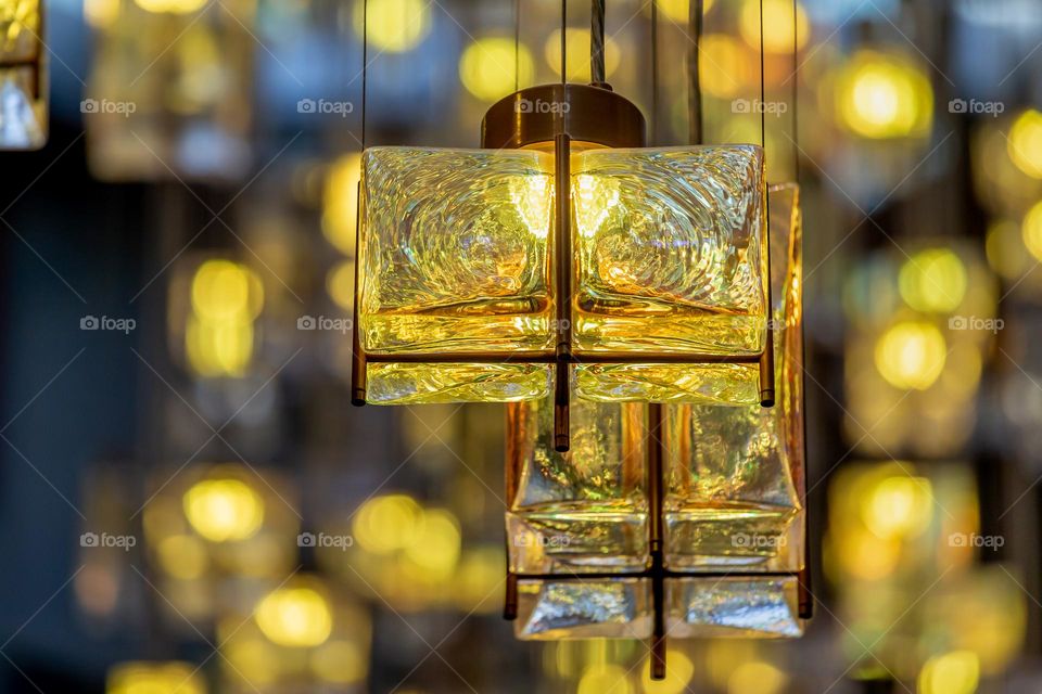 Yellow glass chandelier lit up