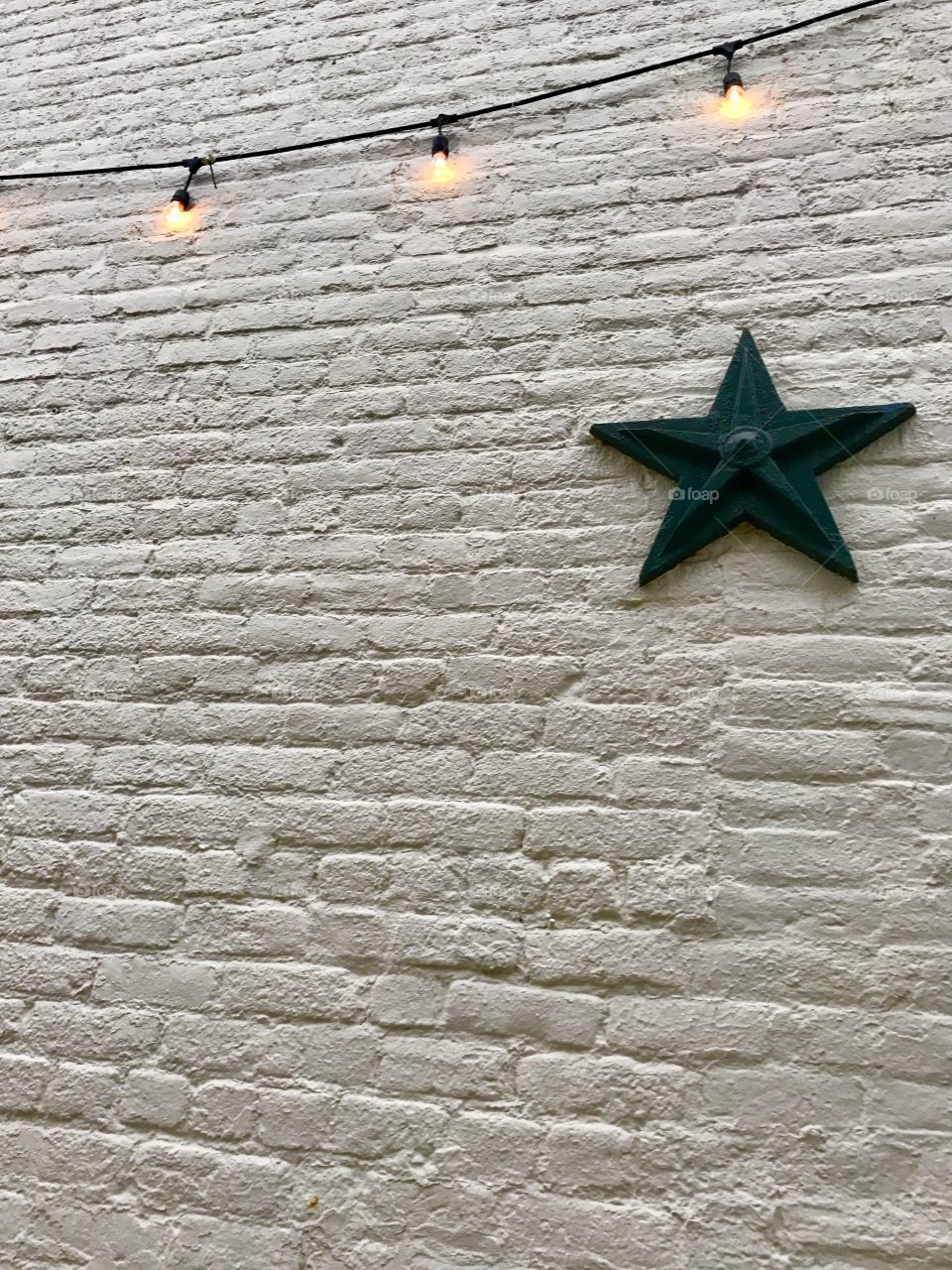 Brick Wall with lights and star