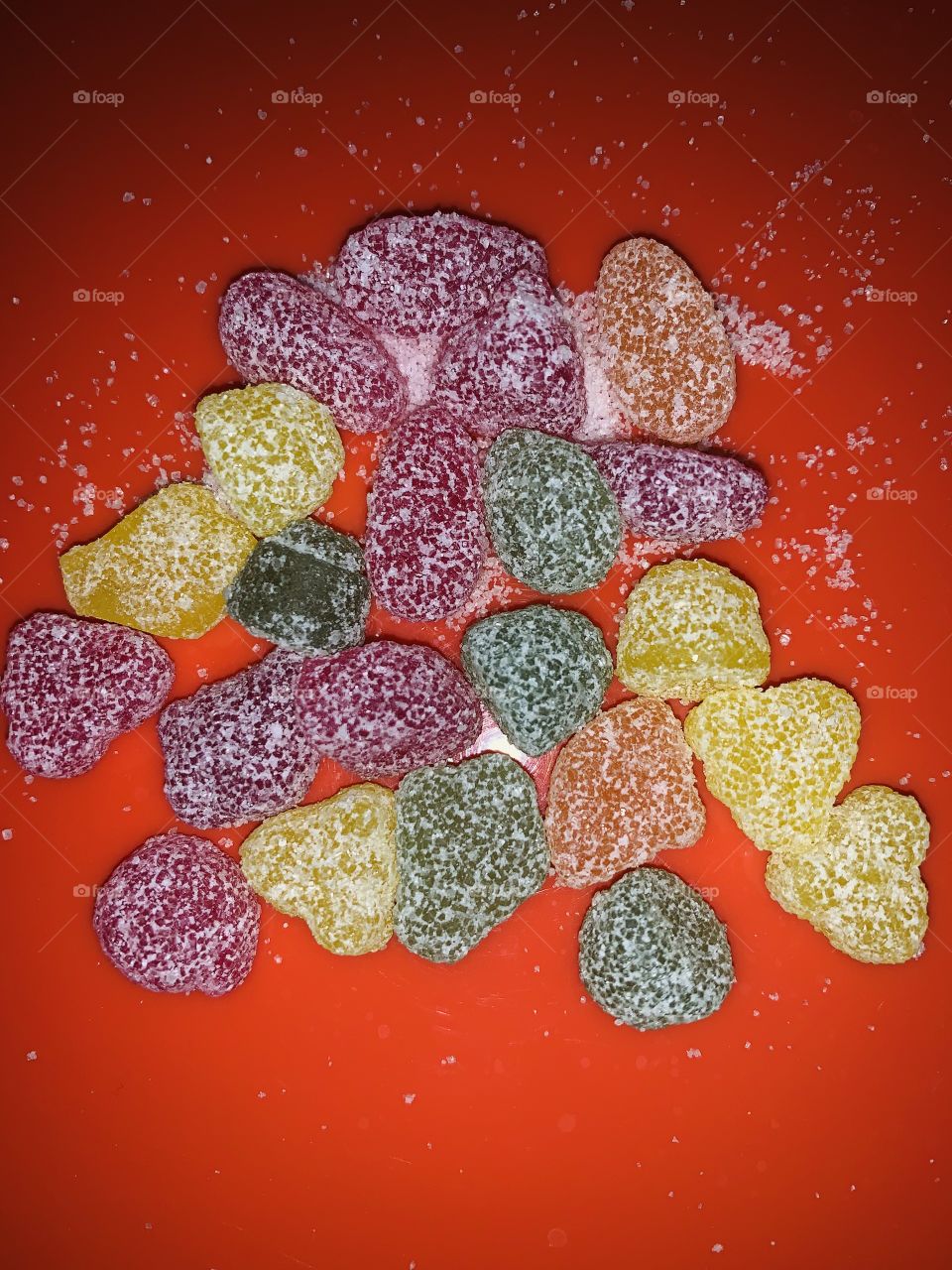 Sour candy covered in sugar 