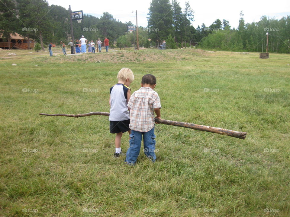 two kids one stick