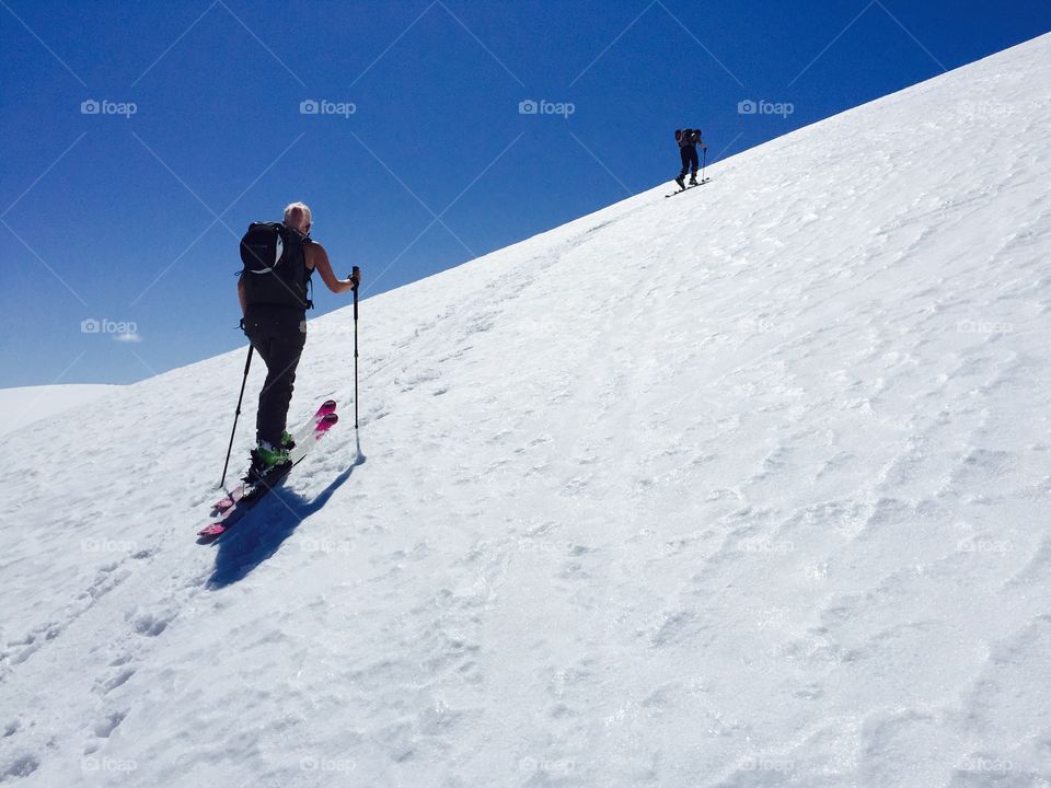 Person skiing on snowy mountain