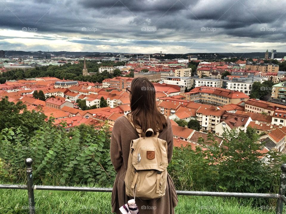 Girl traveler in cloudy Gothenburg 
