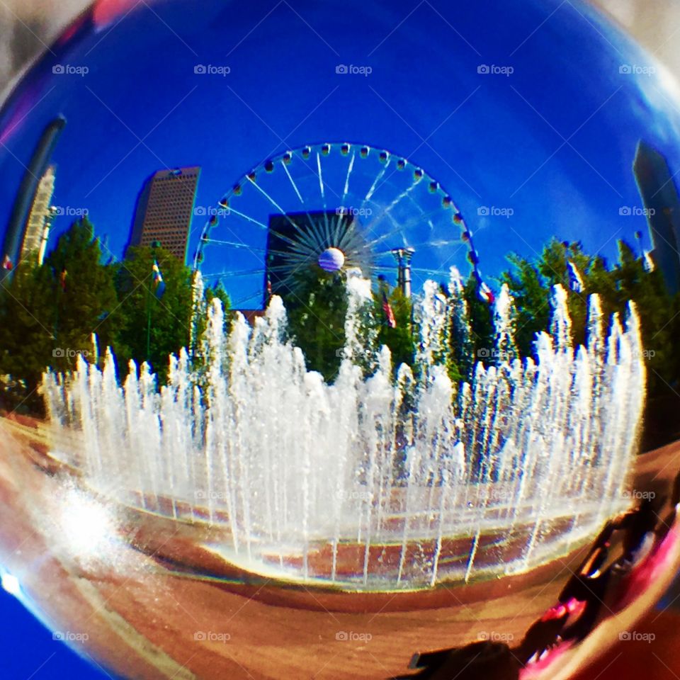 Atlanta’s Centennial Olympic Park Water Rings and Skyview Ferris Wheel through a Crystal Lens Ball. 