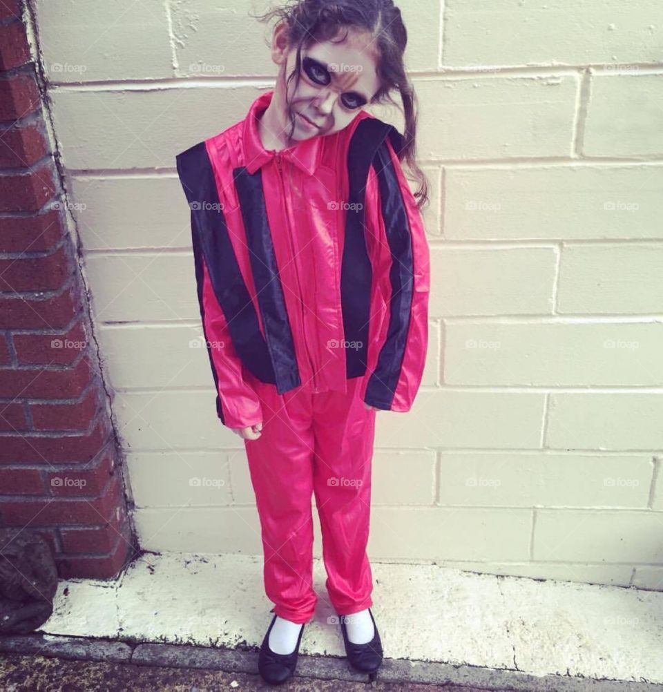 Girl dressed up as Michael Jackson for Halloween 