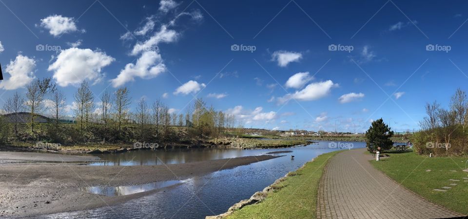Sunny afternoon taking a walk around the pond.  Close to Kopavogur bay in Iceland.