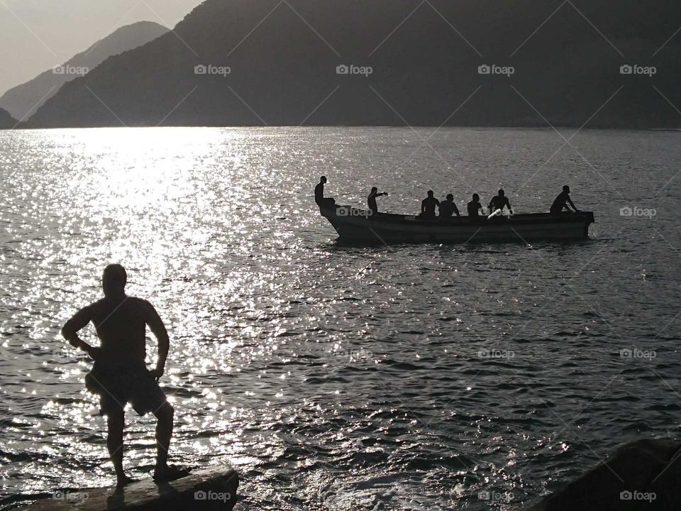 atardecer con pescadores