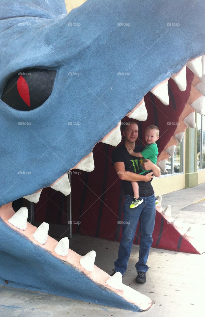 Look dad the shark is trying to eat me and you