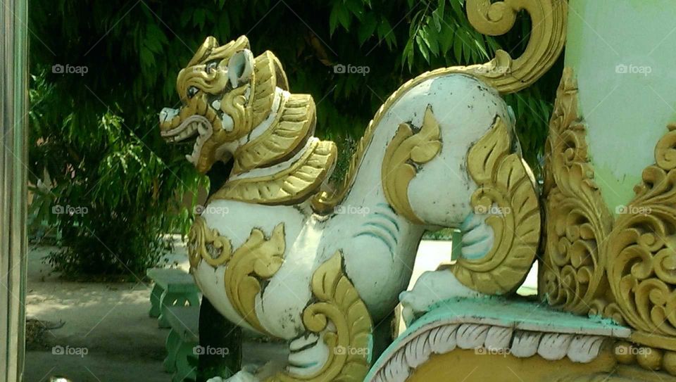 Highly Stylized Lion Guarding Burmese Wat