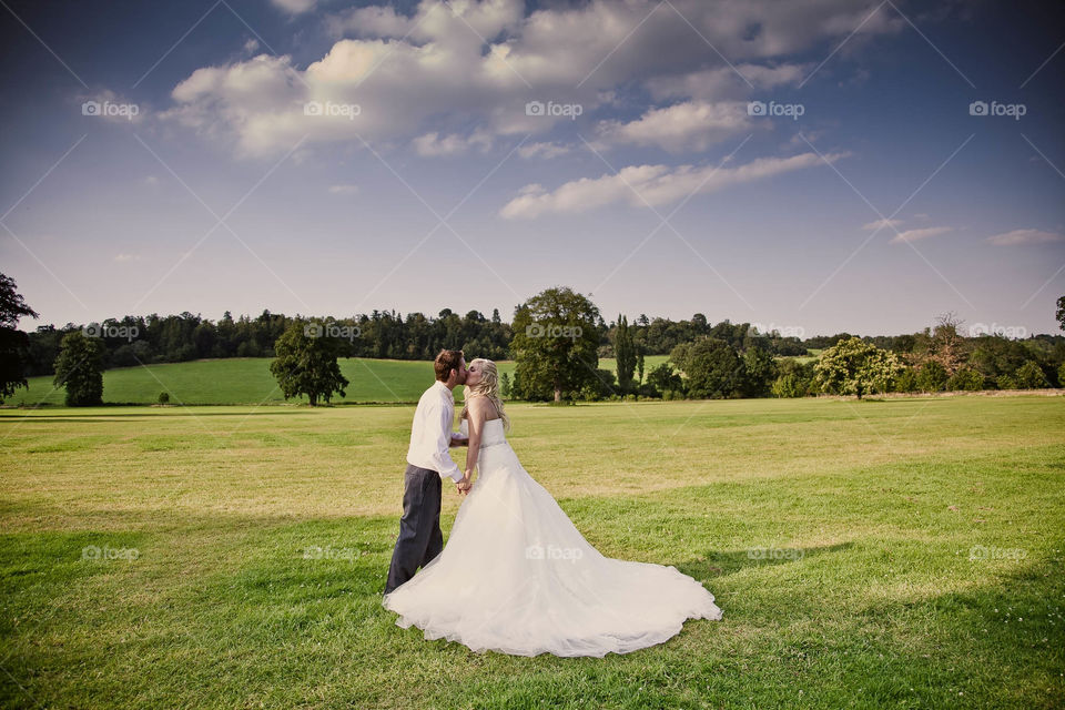 clouds romantic couple countryside by richfordphotog