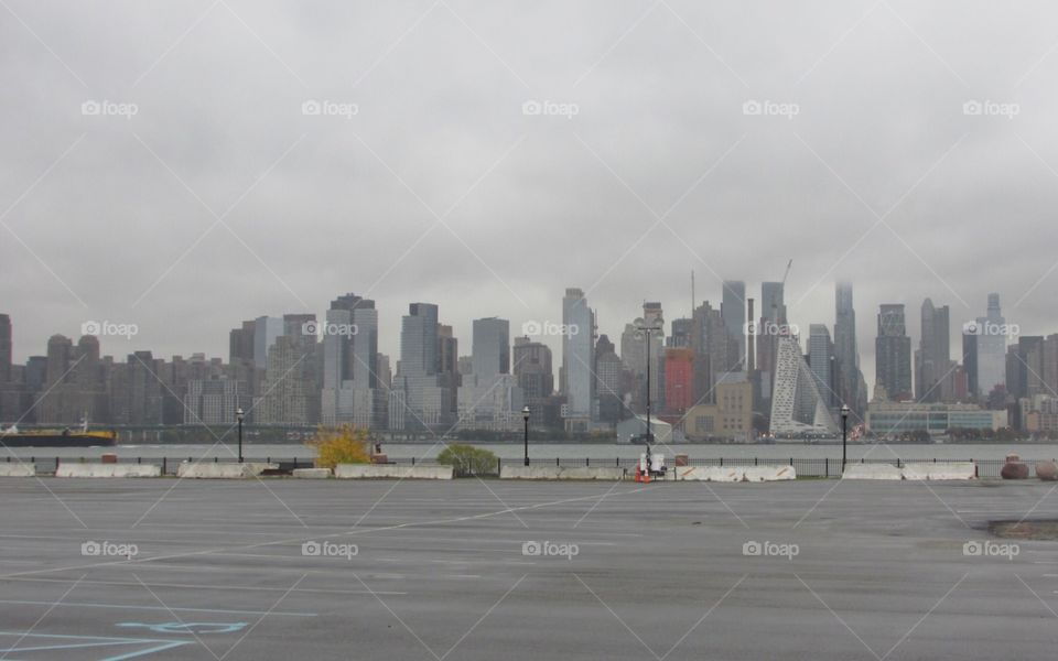 City Skyline on a Cloudy Day. Smog and Urban Pollution. Angle 1
