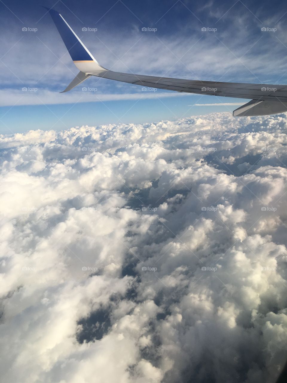 A view from above the clouds while traveling from Albany, NY to Phoenix, AZ