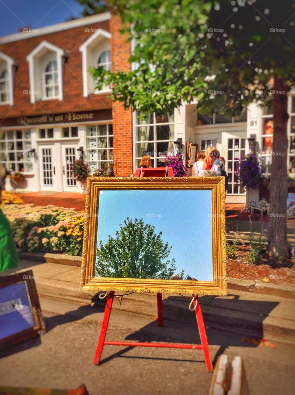 Hidden picture . A mirror juxtaposed in an antique display.