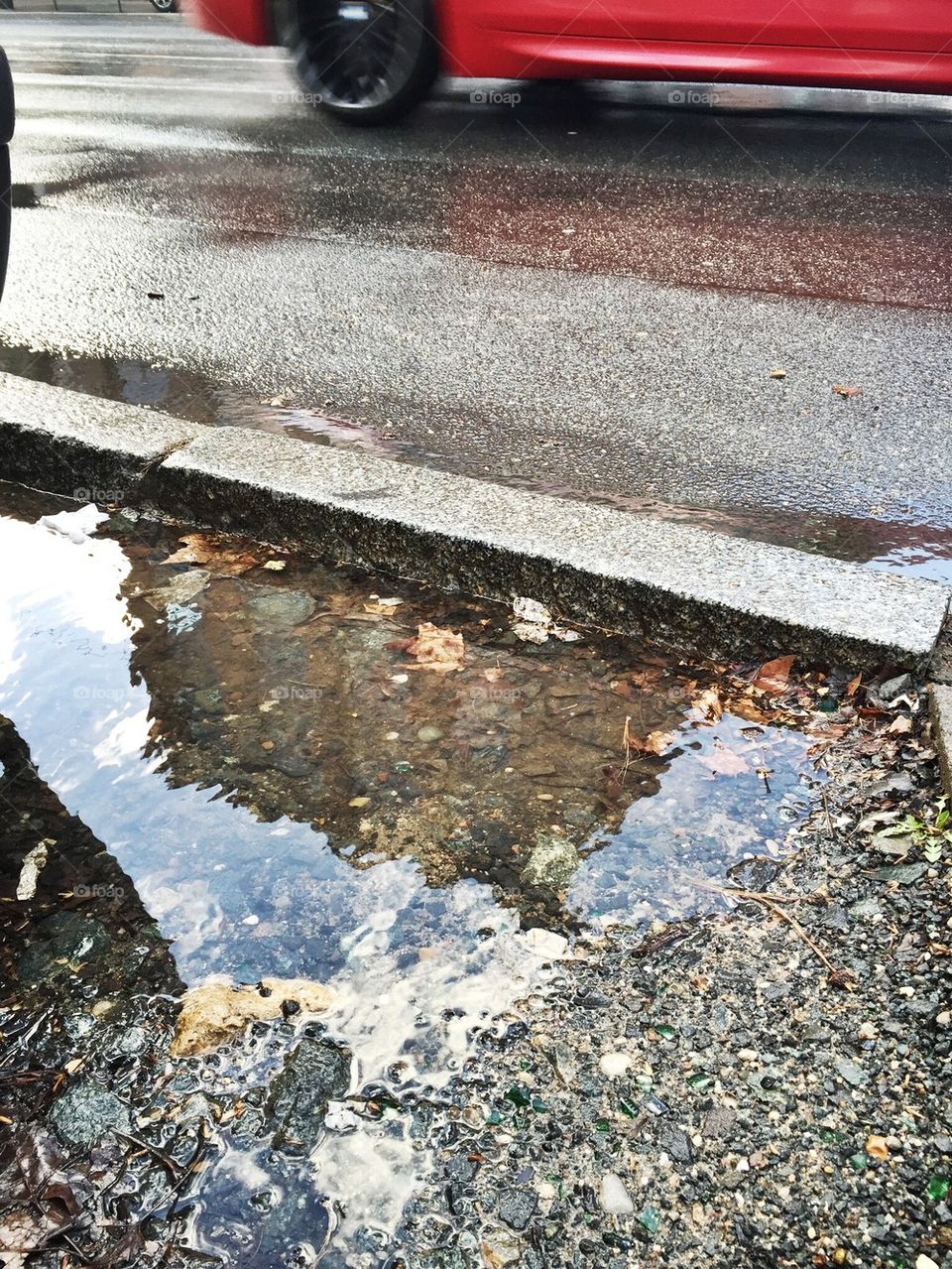 Big puddles on streets on a rainy day